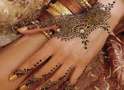 Woman hand with tatoo